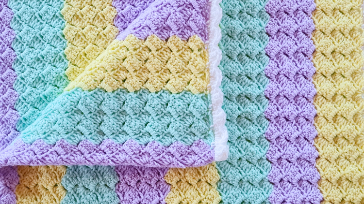 Easiest-Crochet-Baby-Blanket-Pattern-You-ll-Love-The-Sober-Granny Secret Yarnery