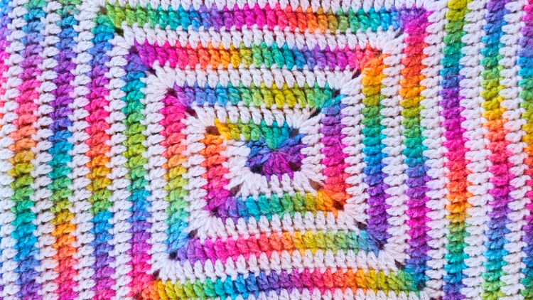 Easy-Crochet-Baby-Blanket-Tutorial-The-Spiral-Crochet-Baby-Blanket Secret Yarnery