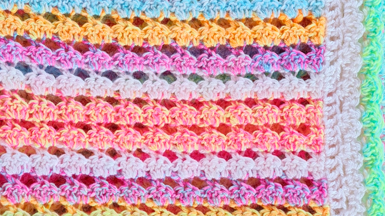 Easy-Crochet-Baby-Blanket-Pattern-Step-by-Step-Candy-Cradle-Pattern Secret Yarnery