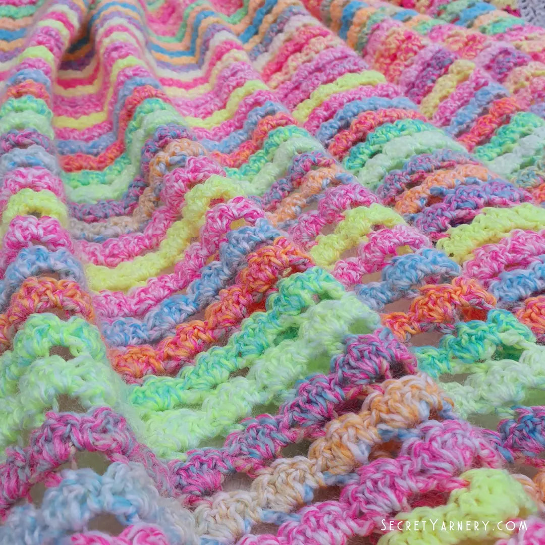 Candy Cradle Crochet Baby Blanket – Cozy Pattern with Stacking Shells Border.