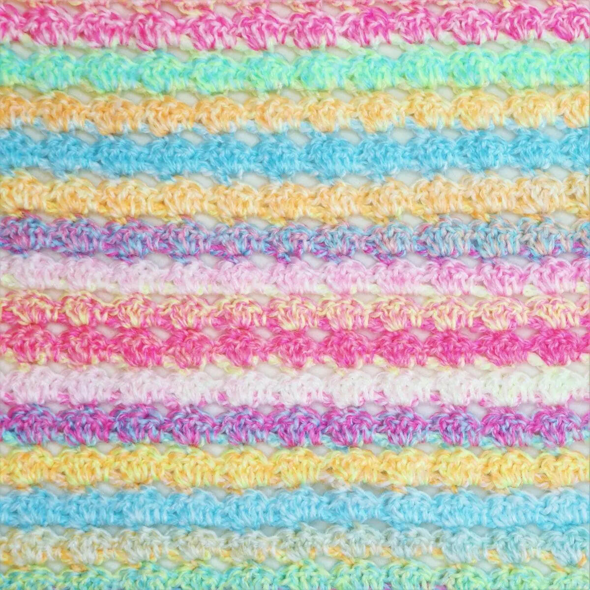 Candy Cradle Crochet Baby Blanket – Cozy Pattern with Stacking Shells Border.