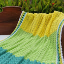 Pin Curl Granny Baby Blanket with Loops & Bridges Border – Elegant Crochet Pattern for Beginners.